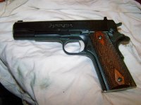 R1 with Colt M1911 Grips.jpg