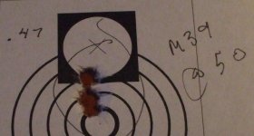 M39 25X scope 180 gr. Sierra 2310 bullet moly 3 inch over all length 50 yards point 47 inch 3 sh.jpg