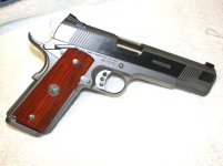 Wilson all stainless Protector 9mm.jpg Wilson all stainless Protector 9mm.jpg