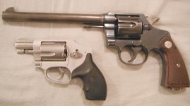 Colt New Service 45 Colt 43 oz 8in S&W 642-2 17.5 oz loaded 2 in 2-6-2014.jpg