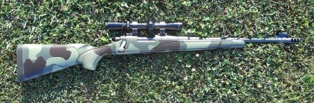 SMALL_Remington 700 custom SPS_308_with Leupold scope.jpg