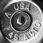 scrape on 45ACP brass across primer b&w.jpg