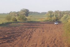 Standing on top of berm with yardage 2.jpg