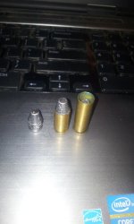 New wildcat 124 grain Lee bullet on the right, 9mm Luger 124 grain lead TC TL Lee in the middle,.jpg